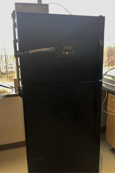 A black single door fridge with freezer compartment built by Mason engineering students